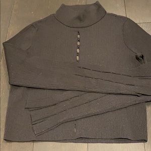 Crop turtle neck with slits down front/back